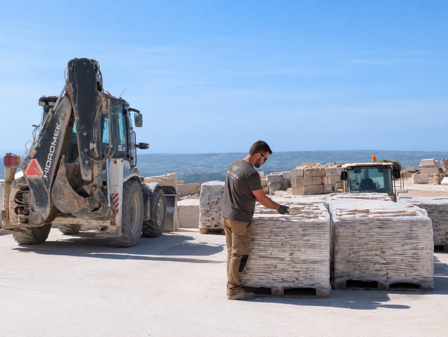 MonteLuso Stone team member preparing palletised limestone for shipment at the quarry yard